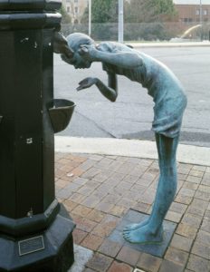 Asheville Urban Trail girl drinking from fountain