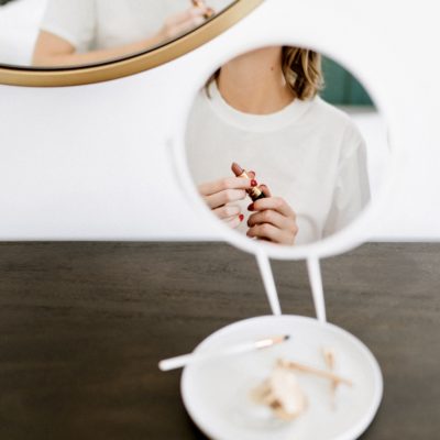 make-up mirror with woman's reflection, best budget beauty buys
